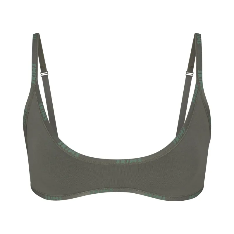 COTTON LOGO SCOOP NECK BRALETTE | JUNIPER sold by SKIMS