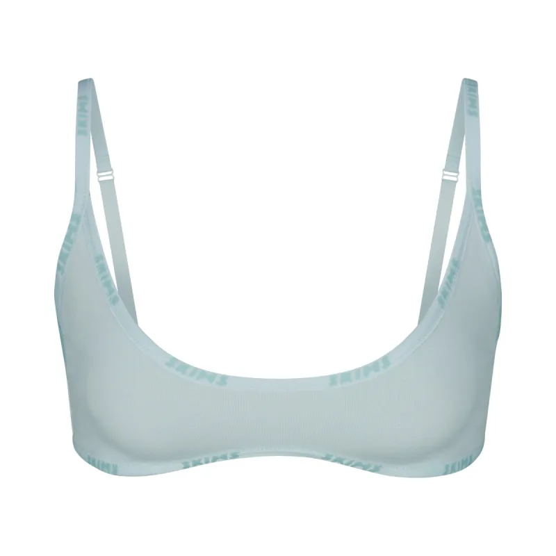 COTTON LOGO SCOOP NECK BRALETTE | FROST sold by SKIMS
