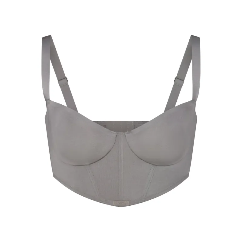 SKIMS LOGO SHINE BALCONETTE CORSET BRA | GREY CHALK sold by SKIMS