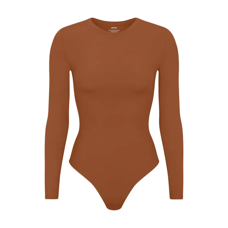 FITS EVERYBODY LONG SLEEVE CREW NECK BODYSUIT | BRONZE sold by SKIMS