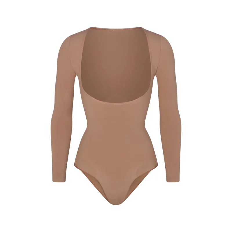 SEAMLESS SCULPT LONG SLEEVE OPEN BUST BRIEF BODYSUIT | SIENNA sold by SKIMS