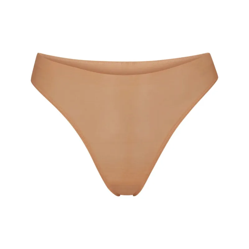 WEIGHTLESS THONG | OCHRE sold by SKIMS