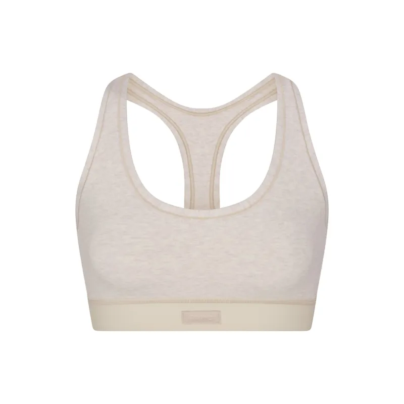 COTTON JERSEY RACERBACK BRA | HEATHER OATMEAL sold by SKIMS