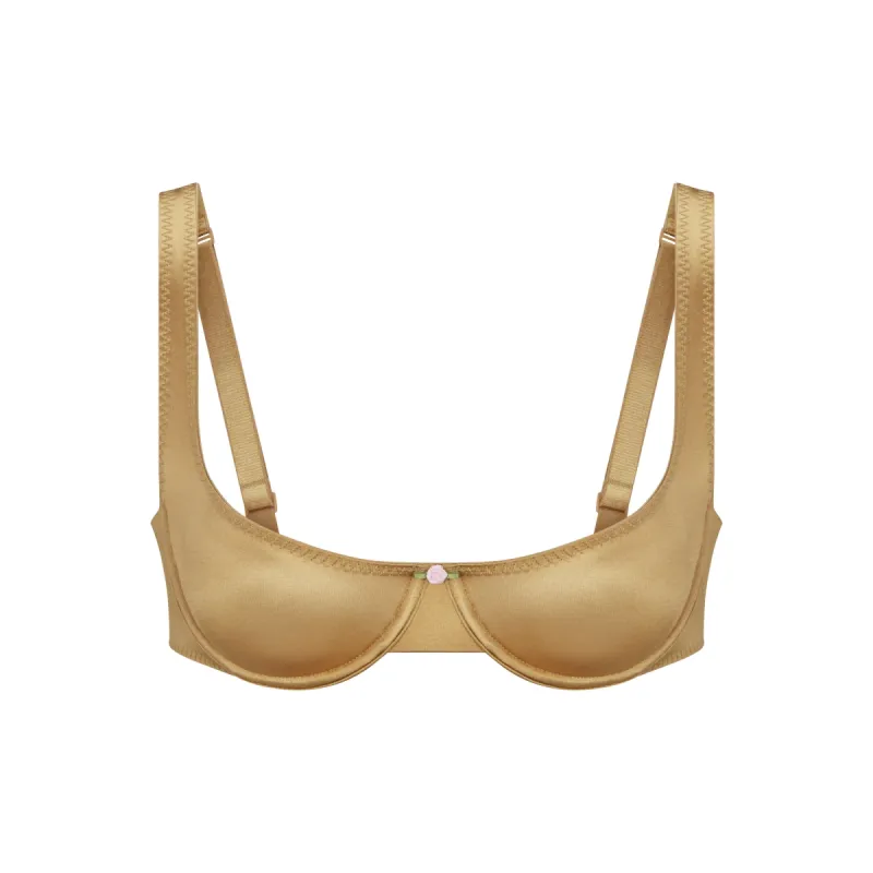 STRETCH SATIN UNLINED SCOOP BRA | PYRITE sold by SKIMS