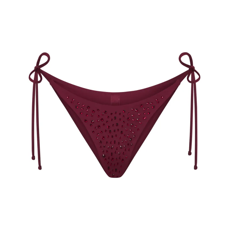 RHINESTONE TIE BIKINI BOTTOM | WINE sold by SKIMS