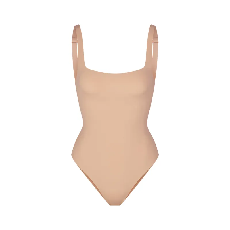 NAKED SCOOP BRIEF BODYSUIT | CLAY sold by SKIMS