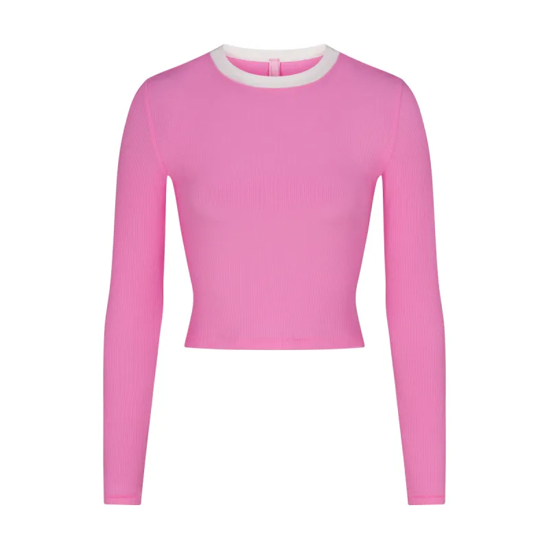 SOFT LOUNGE RINGER LONG SLEEVE CROP TOP | BLUSH sold by SKIMS