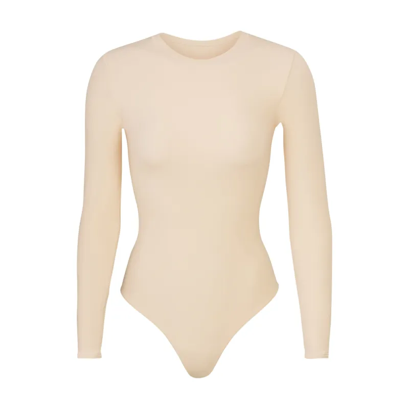 FITS EVERYBODY LONG SLEEVE CREW NECK BODYSUIT | SAND sold by SKIMS