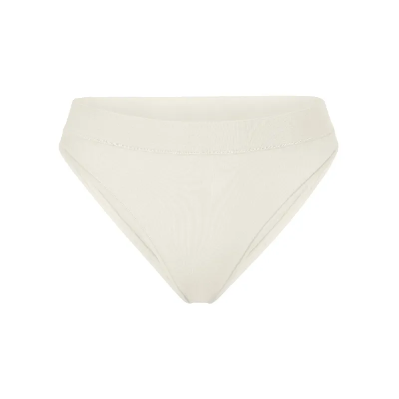 COTTON JERSEY CHEEKY TANGA | BONE sold by SKIMS