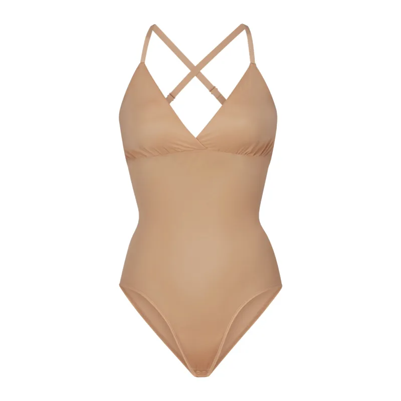 SIMPLY BARE BODYSUIT BRIEF W/ SNAPS | CLAY sold by SKIMS