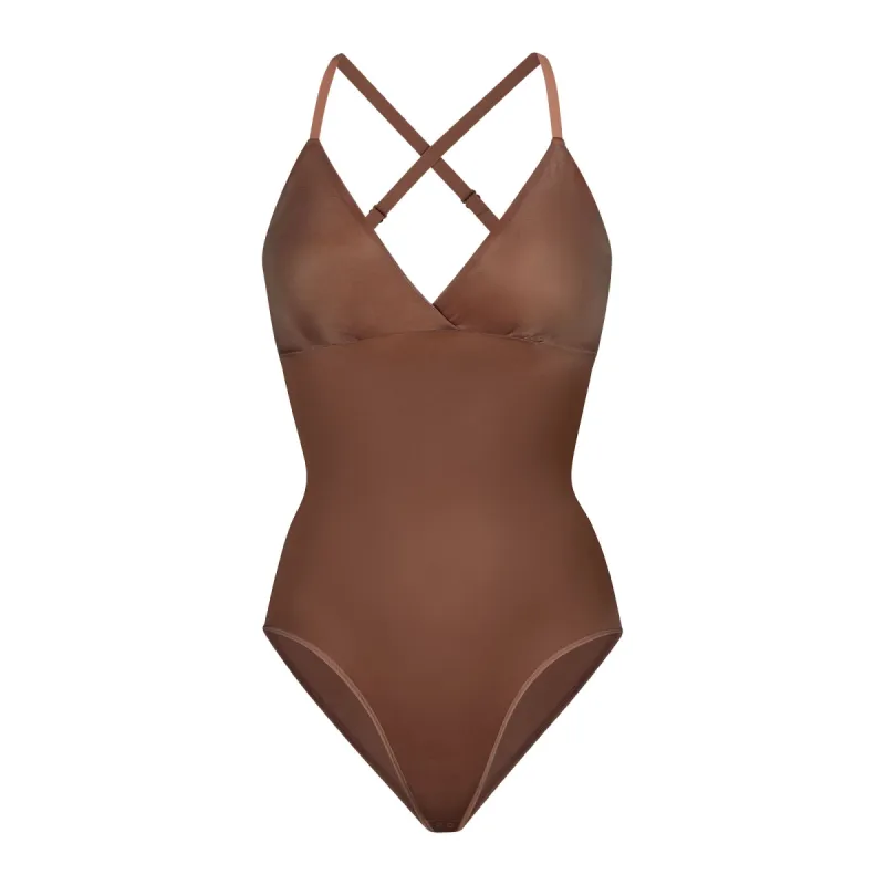 SIMPLY BARE BODYSUIT BRIEF W/ SNAPS | JASPER sold by SKIMS