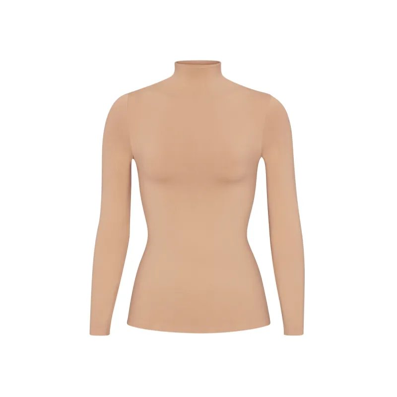 SOFT SMOOTHING SEAMLESS TURTLENECK TOP | OCHRE sold by SKIMS