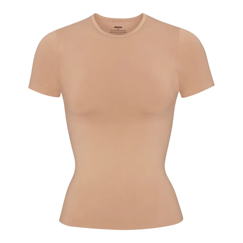SOFT SMOOTHING SEAMLESS T-SHIRT | OCHRE sold by SKIMS
