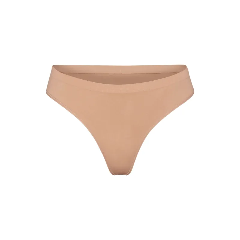 SOFT SMOOTHING SEAMLESS THONG | OCHRE made by SKIMS