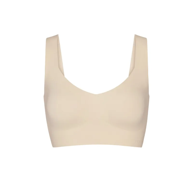 NAKED PLUNGE LONGLINE BRALETTE | SAND sold by SKIMS