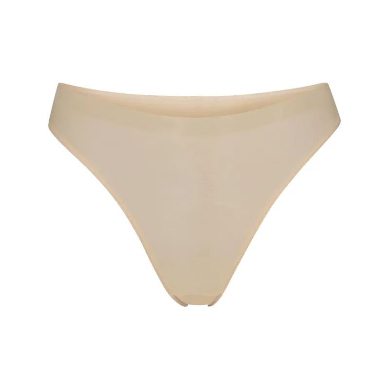 WEIGHTLESS THONG | SAND sold by SKIMS