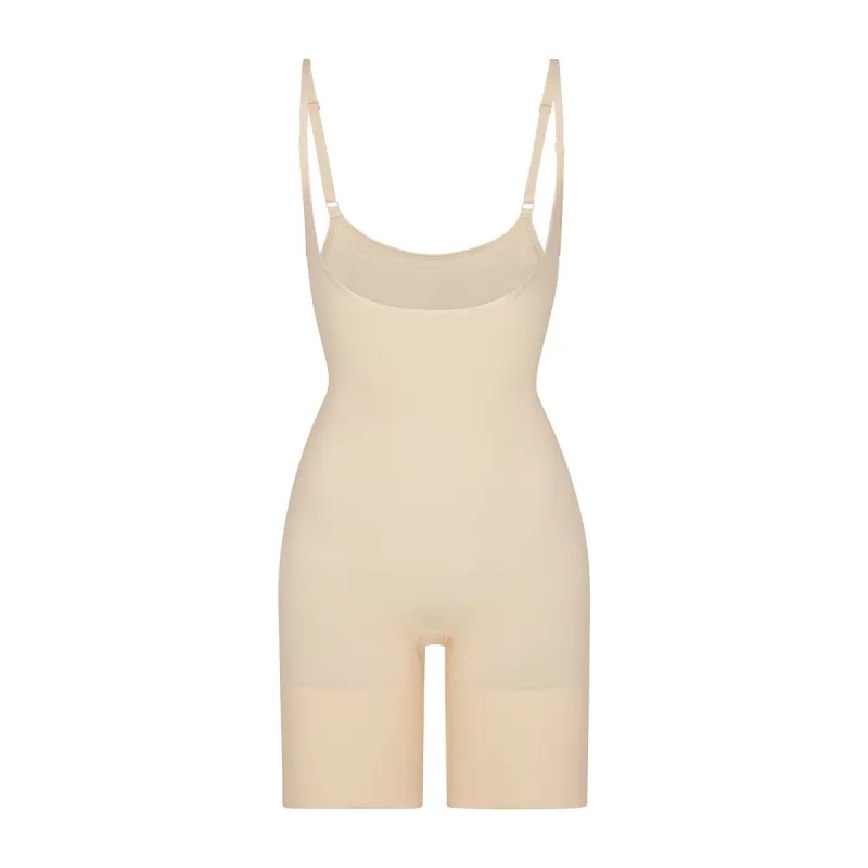 SEAMLESS SCULPT BUTT LIFTING OPEN BUST BODYSUIT | SAND sold by SKIMS