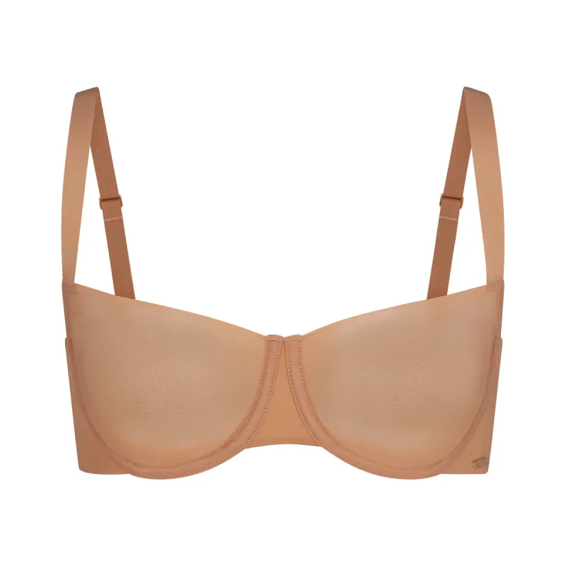 NO SHOW UNLINED BALCONETTE BRA | OCHRE sold by SKIMS