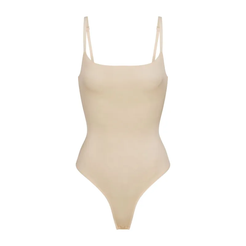 SIMPLY BARE SCOOP BODYSUIT | SAND sold by SKIMS