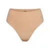 SMOOTHING INTIMATES HIGH-WAISTED THONG | CLAY sold by SKIMS