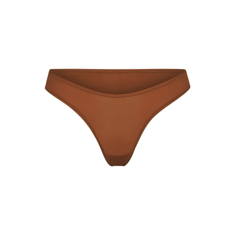 FITS EVERYBODY DIPPED FRONT THONG | BRONZE sold by SKIMS