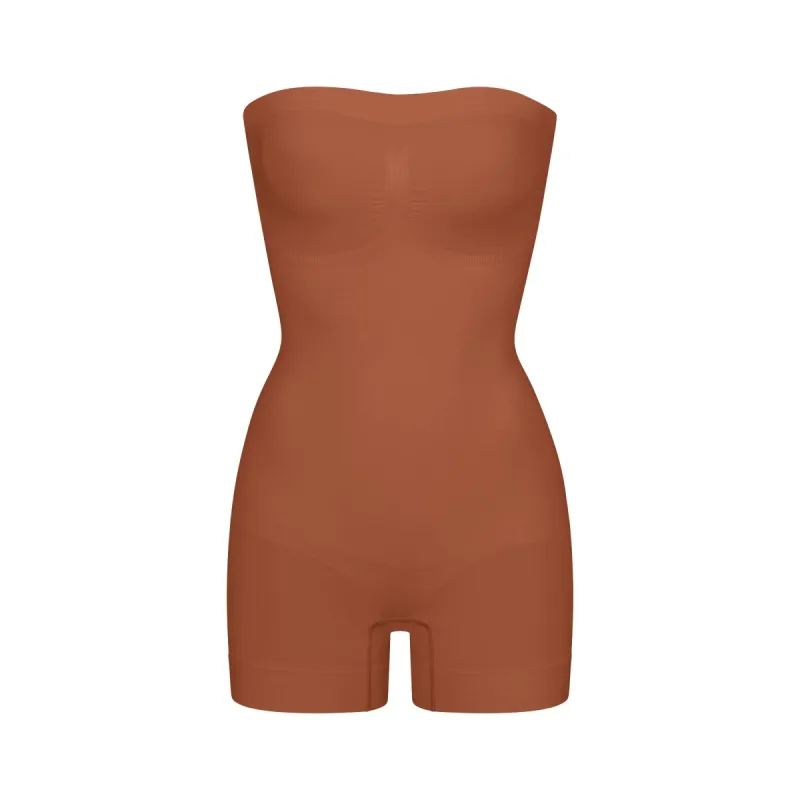 SEAMLESS SCULPT STRAPLESS SHORTIE BODYSUIT | BRONZE sold by SKIMS