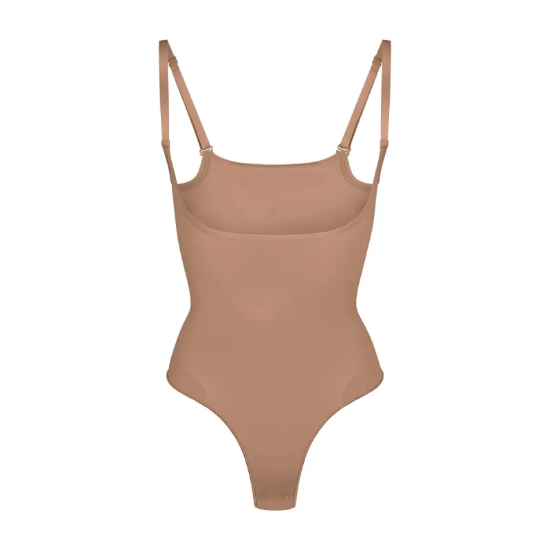 SEAMLESS SCULPT OPEN BUST THONG BODYSUIT | SIENNA sold by SKIMS