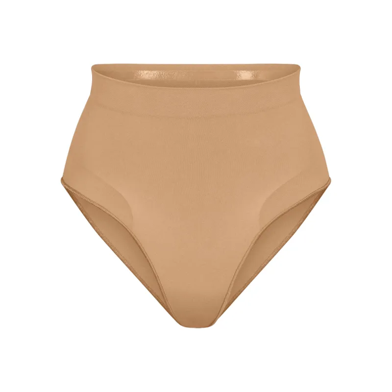 SEAMLESS SCULPT MID WAIST BRIEF | OCHRE sold by SKIMS