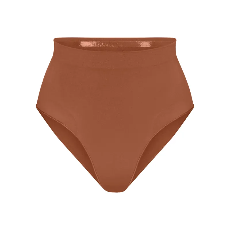 SEAMLESS SCULPT MID WAIST BRIEF | BRONZE sold by SKIMS