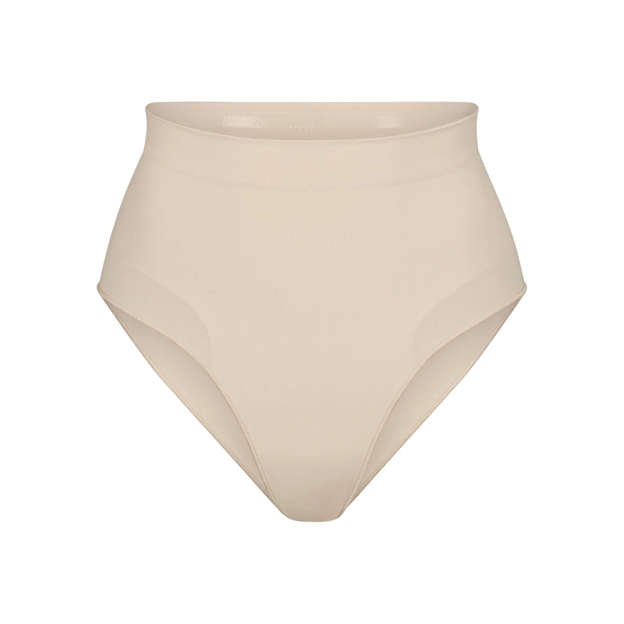 SEAMLESS SCULPT MID WAIST BRIEF | SAND sold by SKIMS