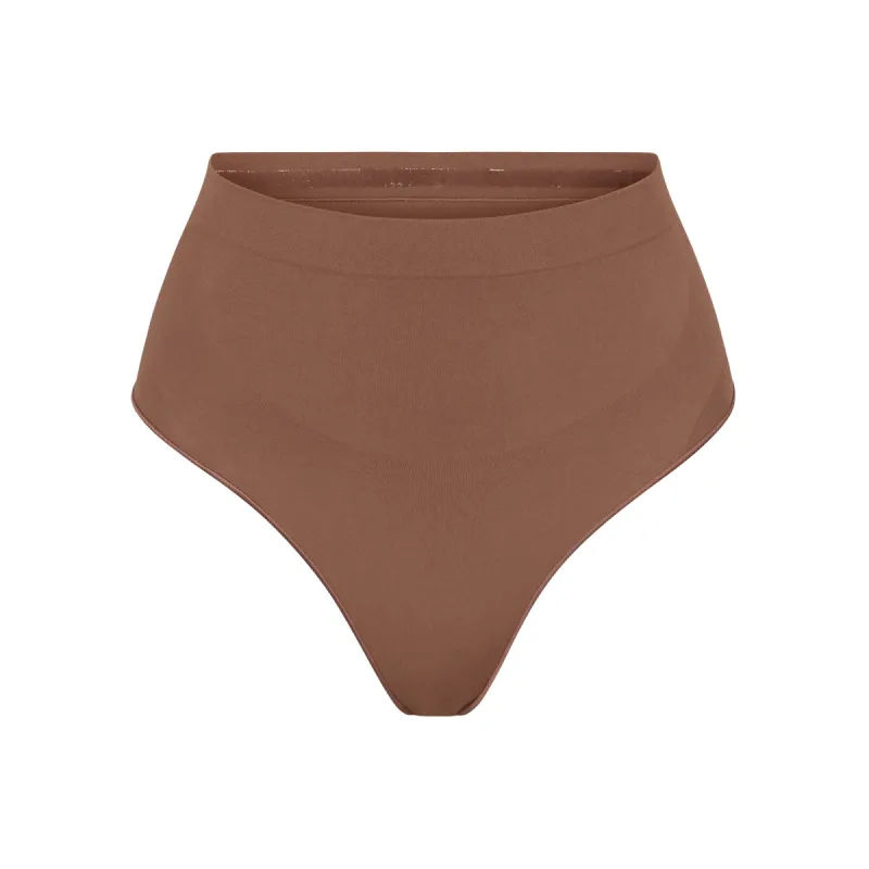 SEAMLESS SCULPT MID WAIST THONG | JASPER sold by SKIMS