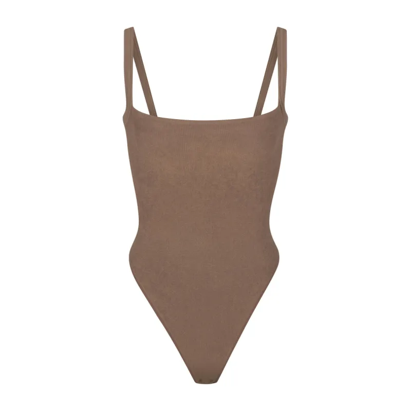 TERRY LOUNGE SEAMLESS BODYSUIT | OXIDE sold by SKIMS