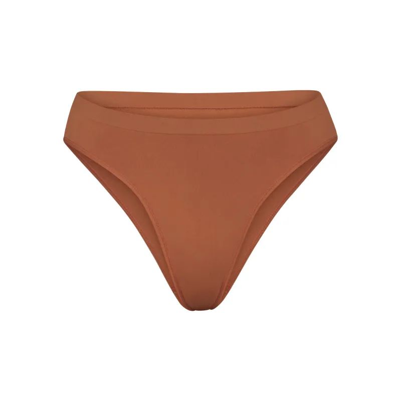 SOFT SMOOTHING SEAMLESS BRIEF | BRONZE sold by SKIMS