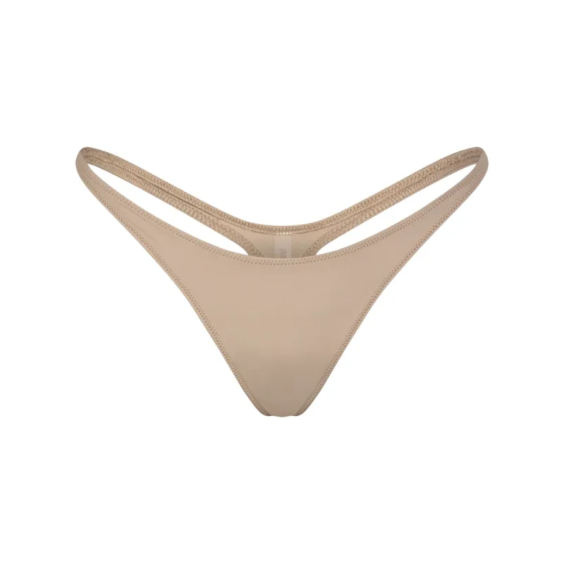 SIGNATURE SWIM THONG | DESERT sold by SKIMS