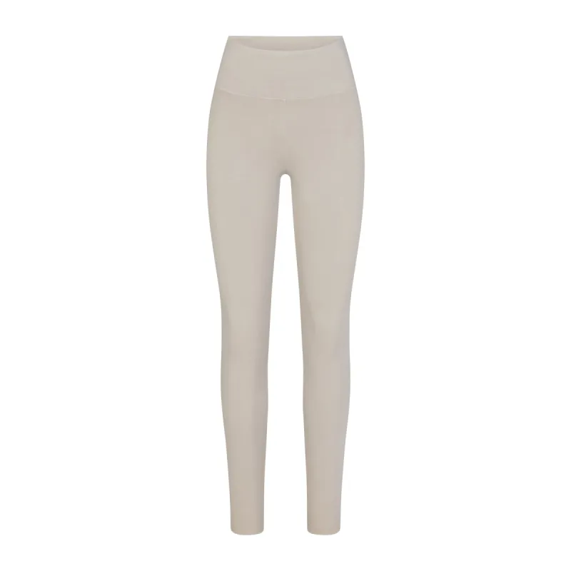 OUTDOOR HIGH-WAISTED BANDED LEGGING | STONE sold by SKIMS