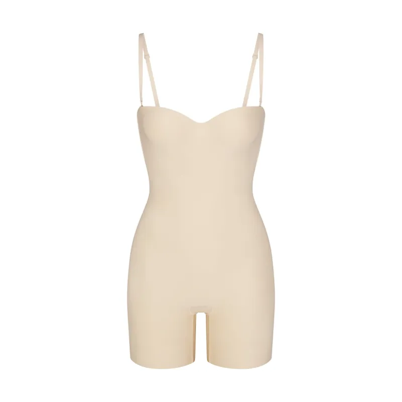 SKIMS BODY UNDERWIRE MID THIGH BODYSUIT | SAND sold by SKIMS