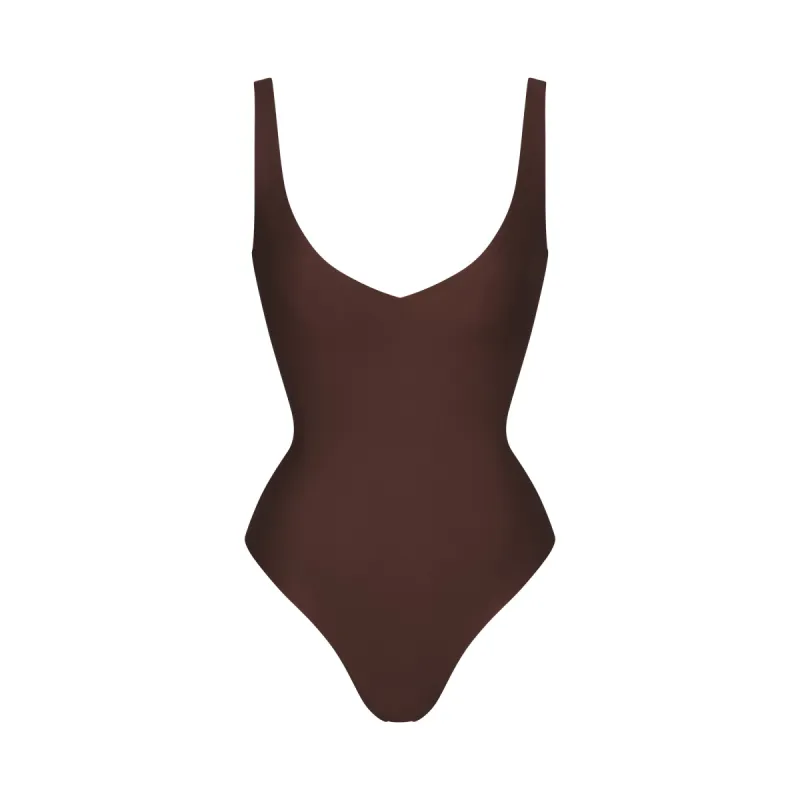 SKIMS BODY UNLINED PLUNGE THONG BODYSUIT | COCOA sold by SKIMS