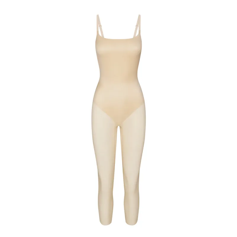 SIMPLY BARE LOW BACK CATSUIT | SAND sold by SKIMS