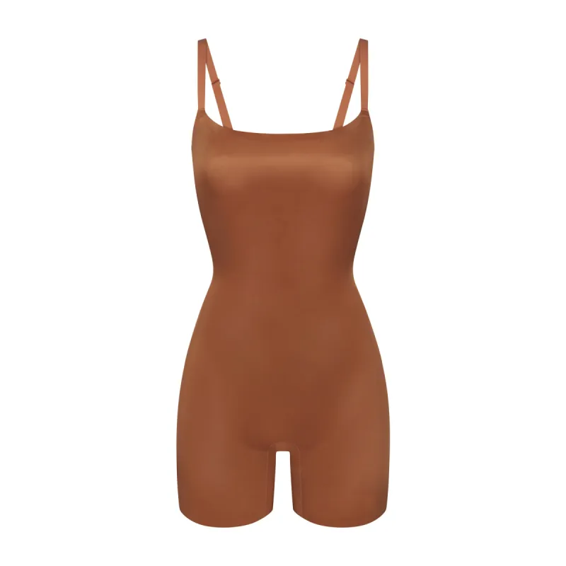 SIMPLY BARE LOW BACK MID THIGH BODYSUIT | BRONZE sold by SKIMS
