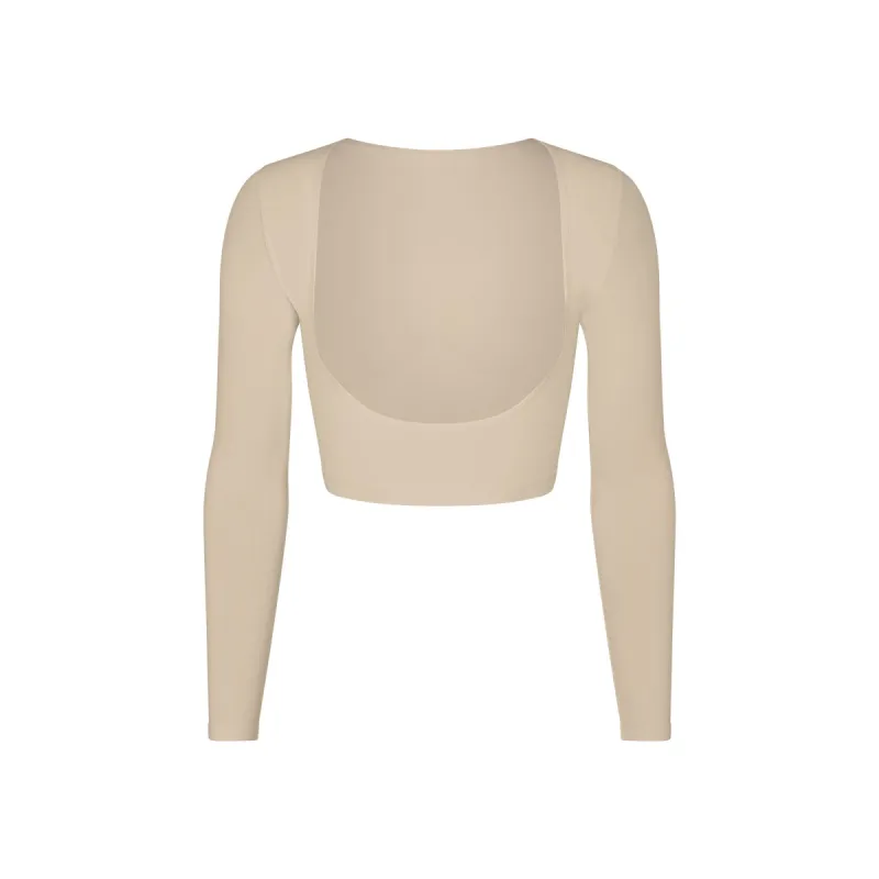 SEAMLESS SCULPT OPEN BUST ARM SHAPER | SAND sold by SKIMS