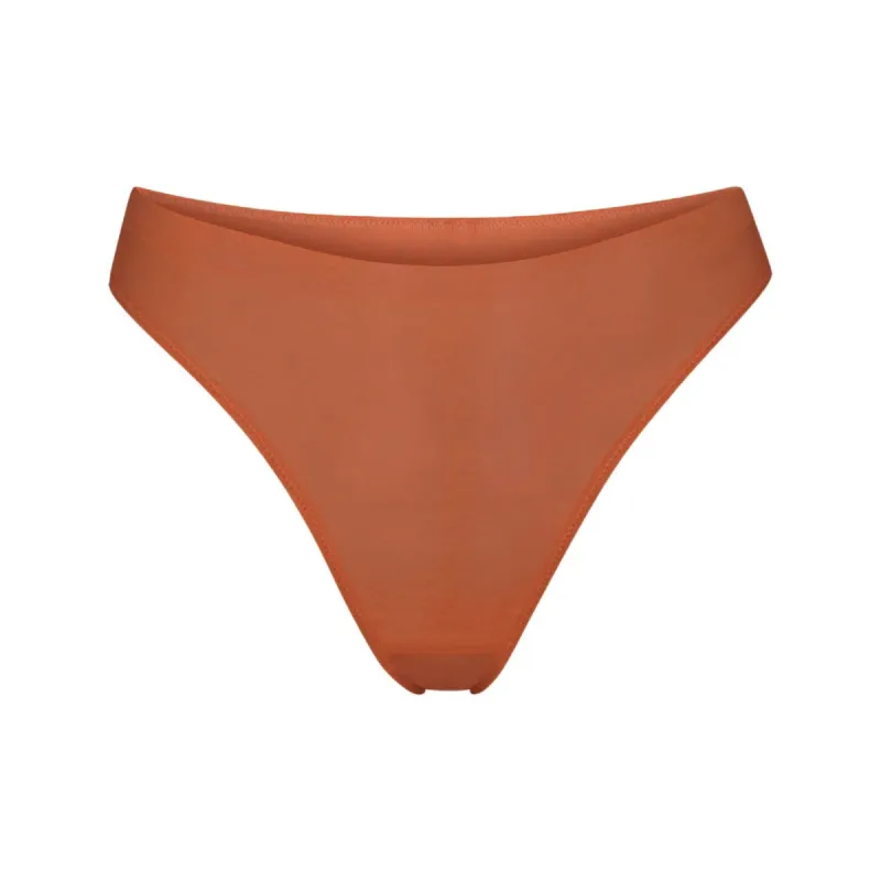 WEIGHTLESS THONG | BRONZE sold by SKIMS