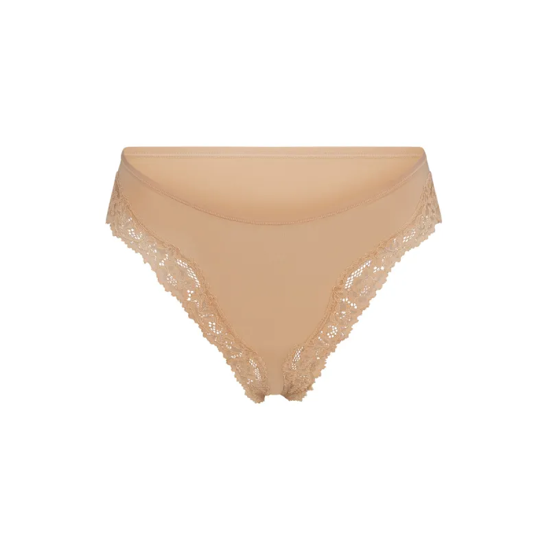 FITS EVERYBODY LACE TANGA | CLAY sold by SKIMS