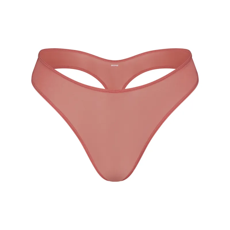 JELLY SHEER DIPPED THONG | TERRACOTTA sold by SKIMS