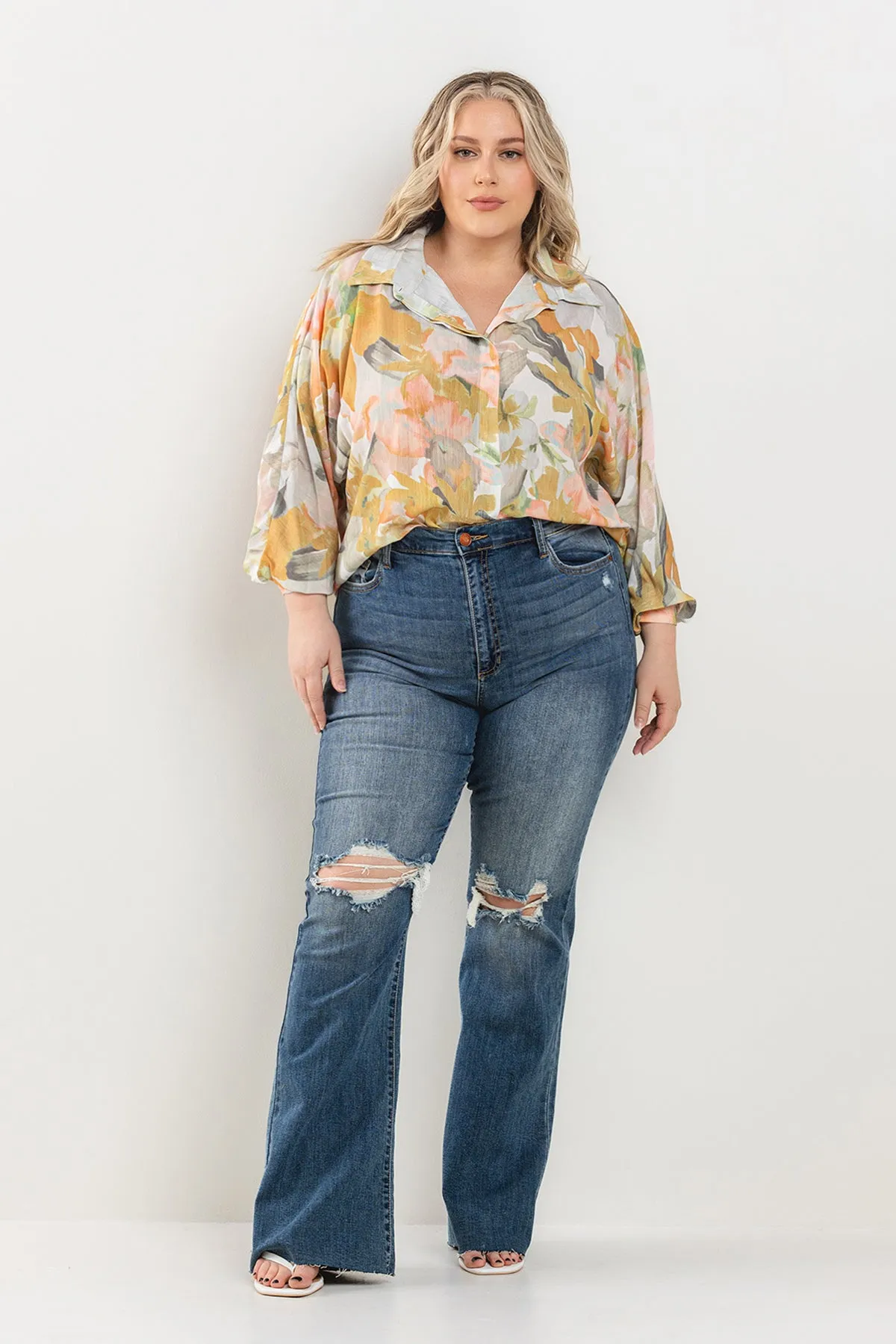 HIGH RISE KNEE DISTRESSED WIDE FLARE LEG JEANS - PLUS sold by Sneak Peek