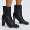 Eon Tall Boot Black sold by Sol Sana