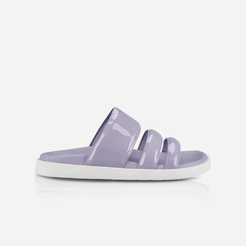 Pia Footbed Patent Lavender sold by Sol Sana