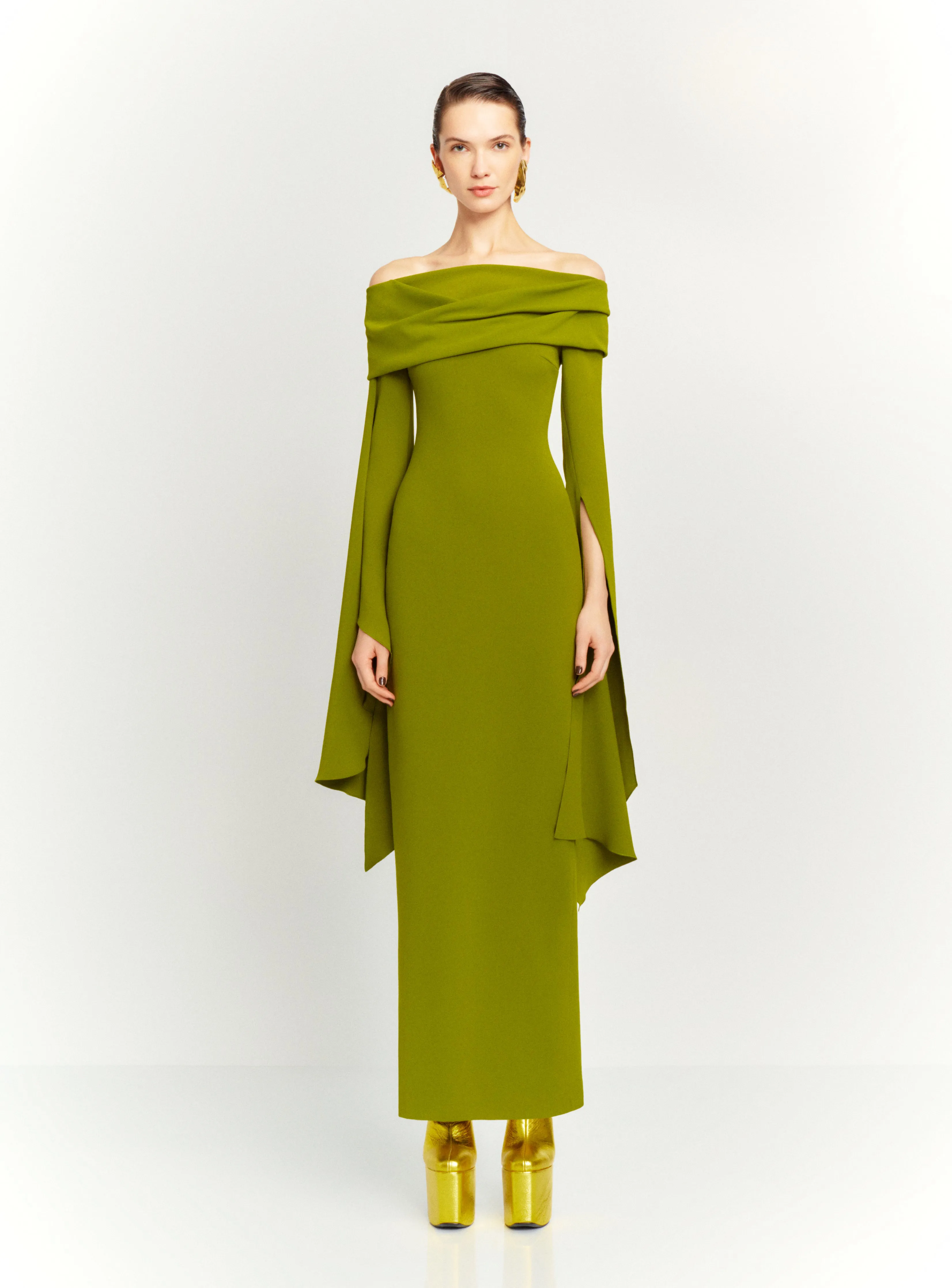 The Arden Maxi Dress in Sweet Pea Green sold by Solace London