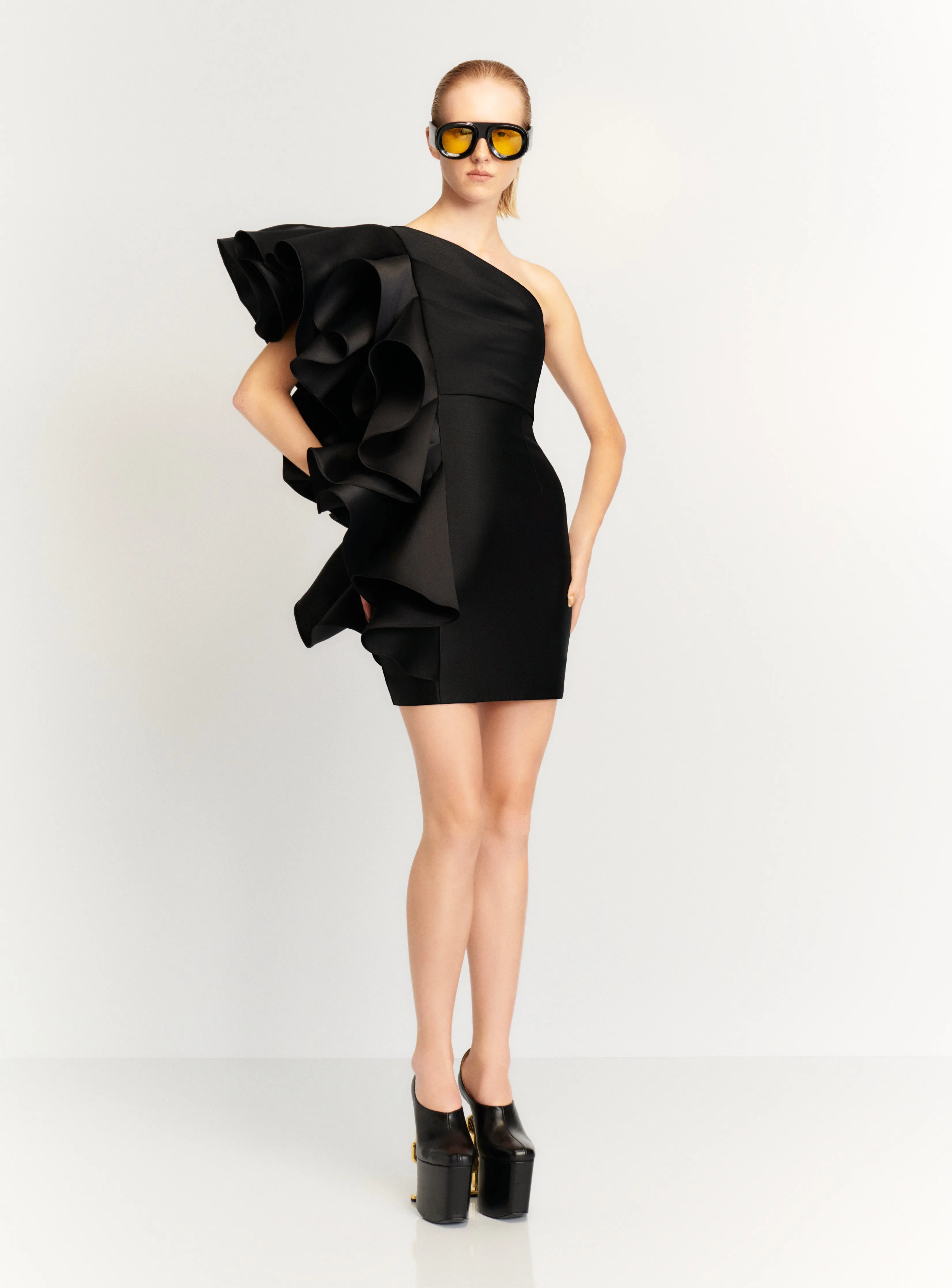 The Rio Mini Dress in Black sold by Solace London