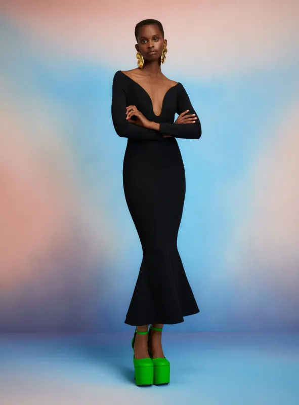 The Isa Midi Dress in Black sold by Solace London