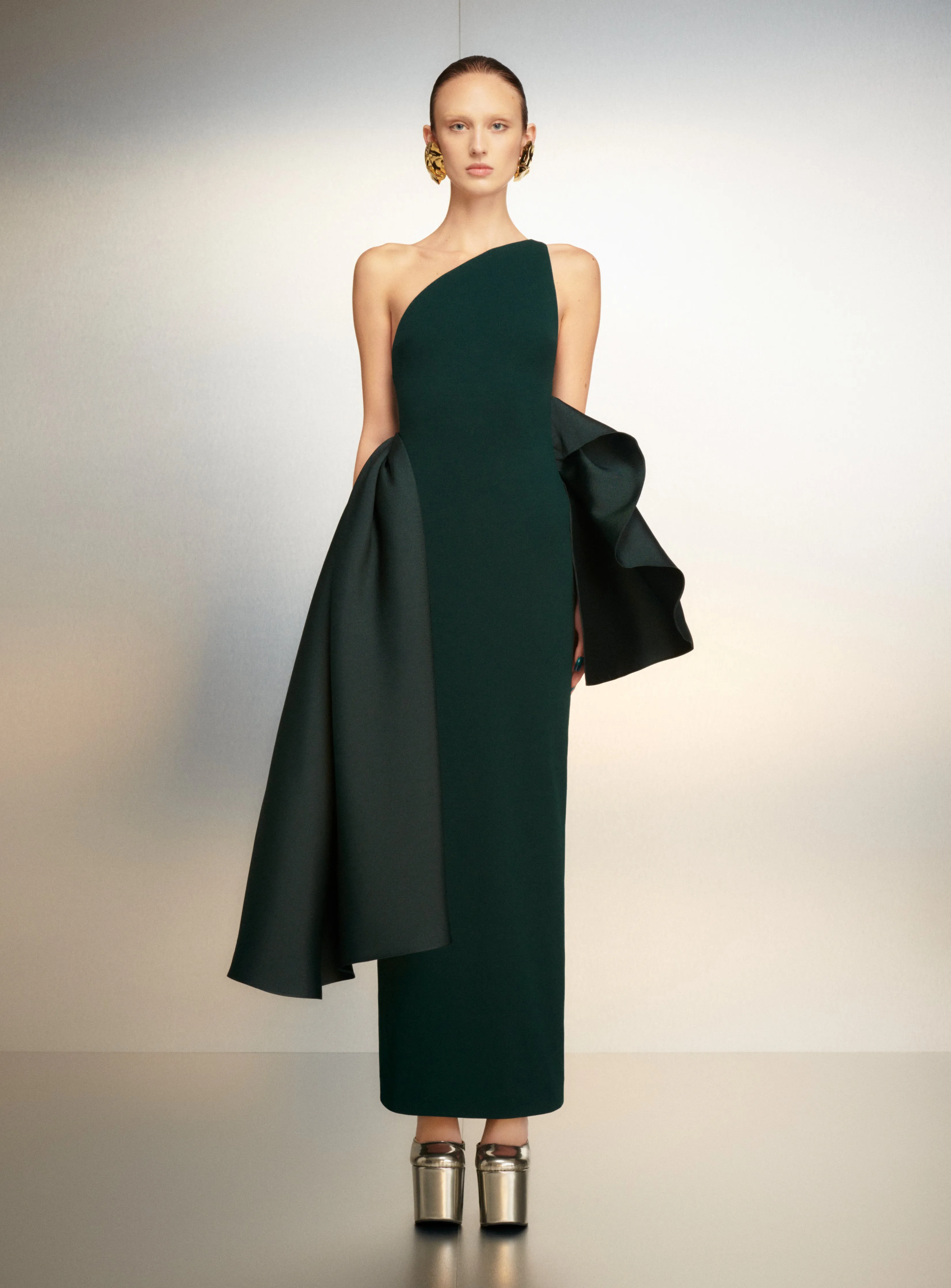 The Calla Maxi Dress in Emerald Green sold by Solace London